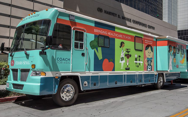 Image of the Cedars‑Sinai COACH (Community Outreach Assistance for Children’s Health) for Kids mobile medical clinic.